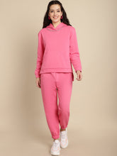 Embellished hoodie with high-low hem combined with jogger