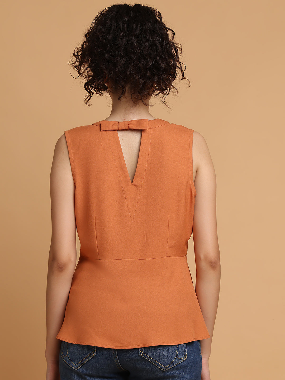 Dusty Orange Peplum Top With Back Bow