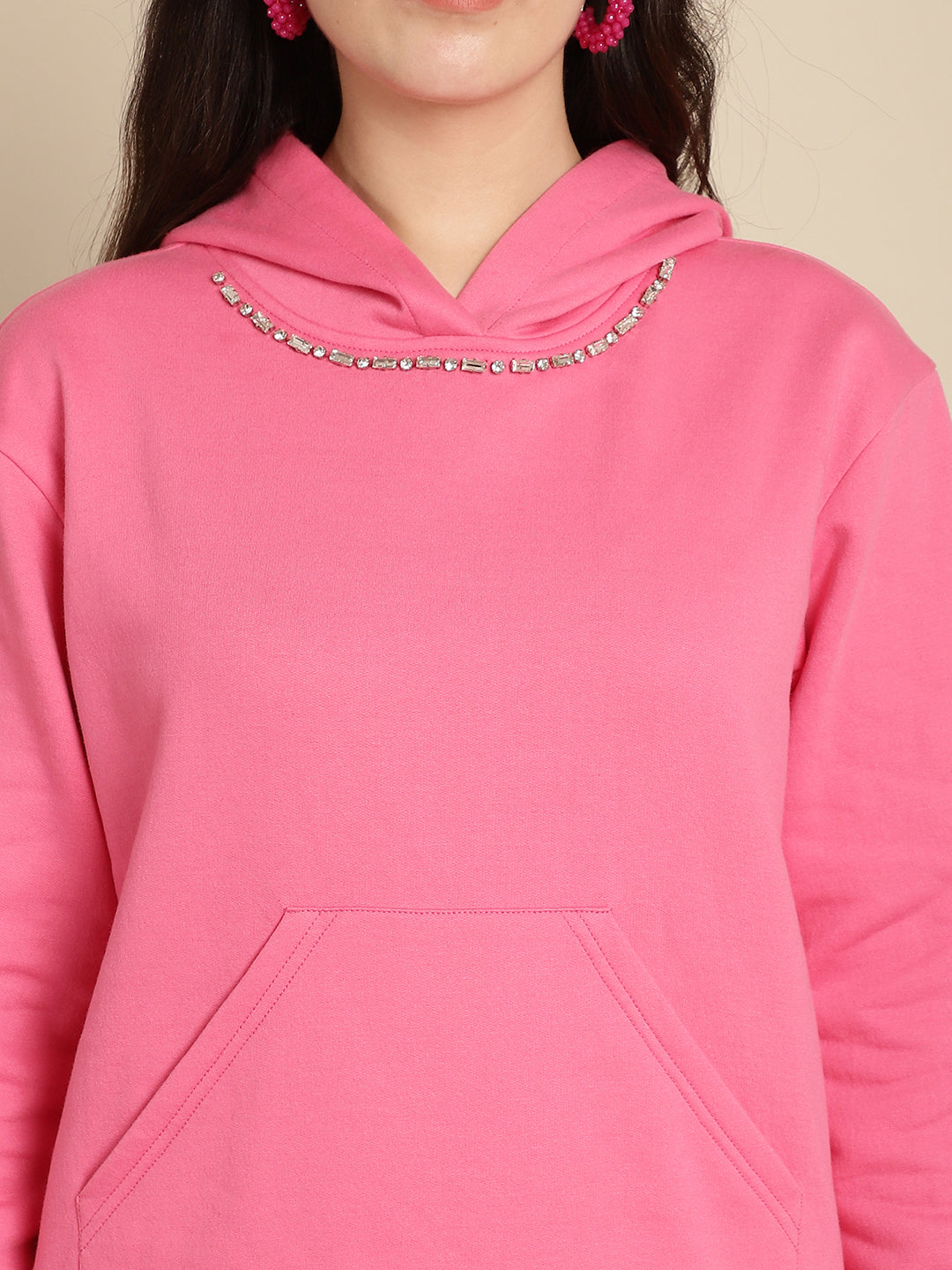 Embellished hoodie with high-low hem combined with jogger