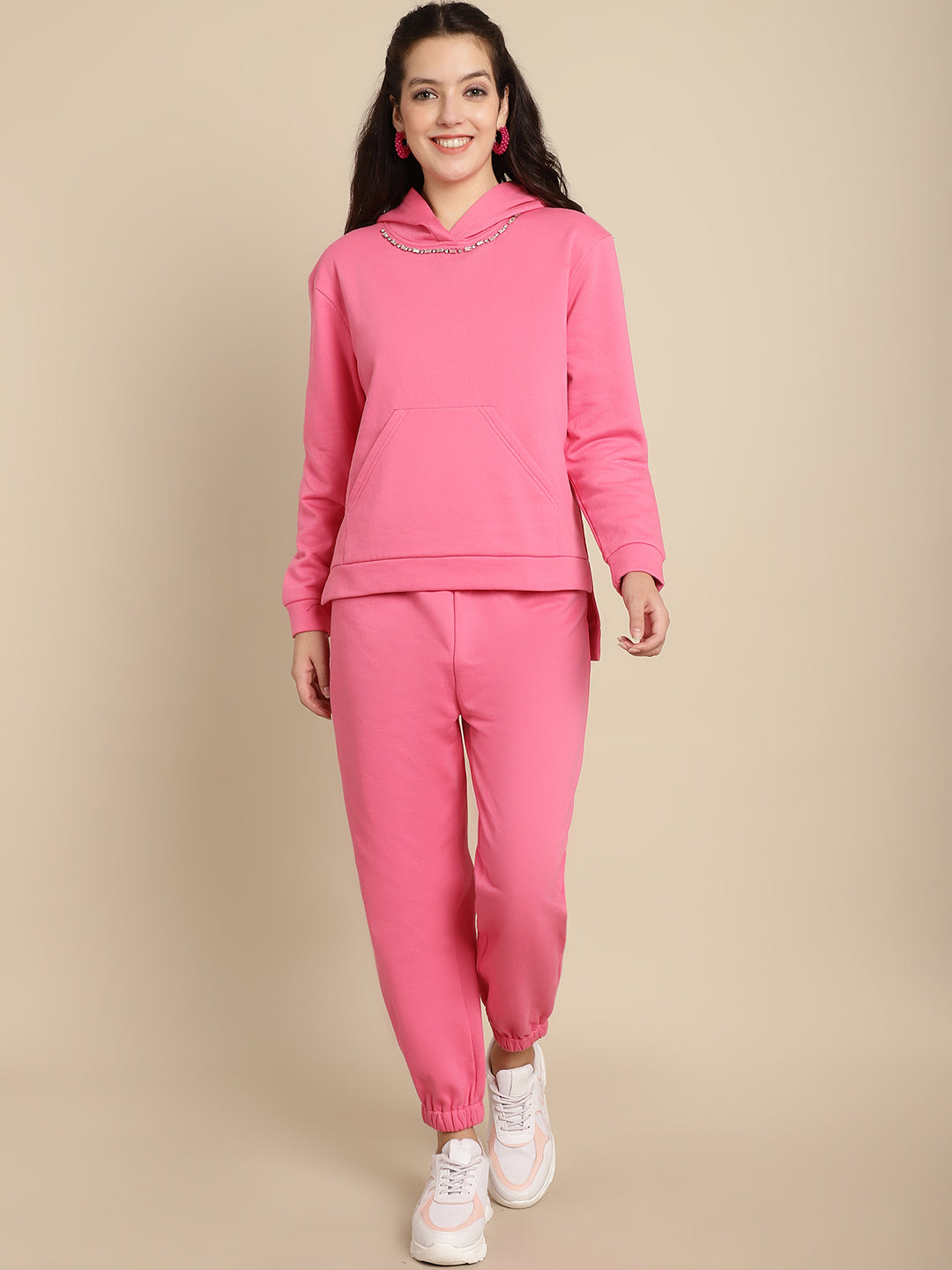 Embellished hoodie with high-low hem combined with jogger