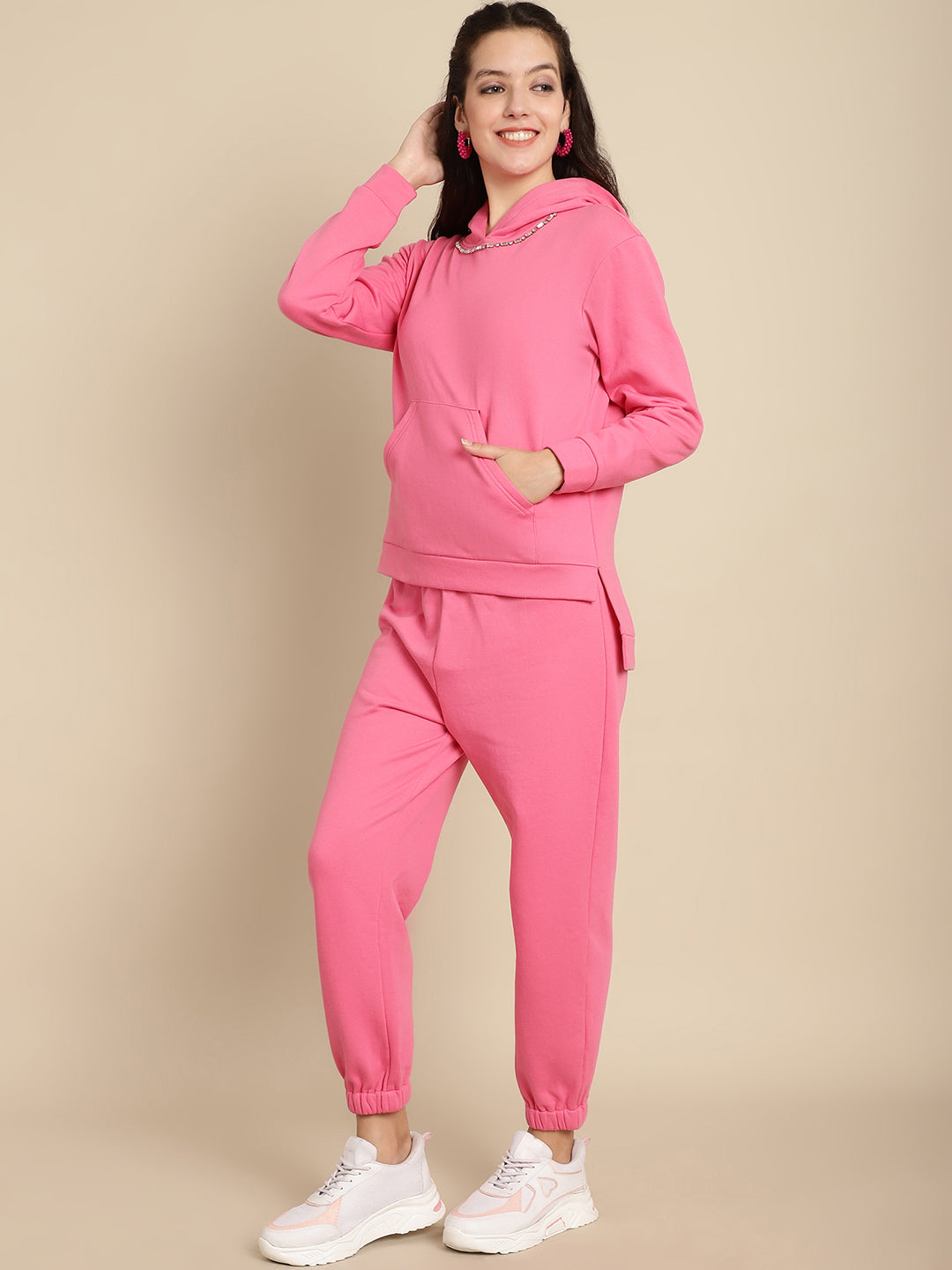 Embellished hoodie with high-low hem combined with jogger