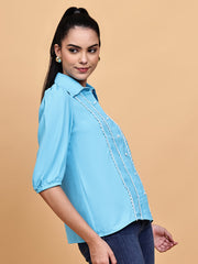 Deep cyan blue shirt with loop detail